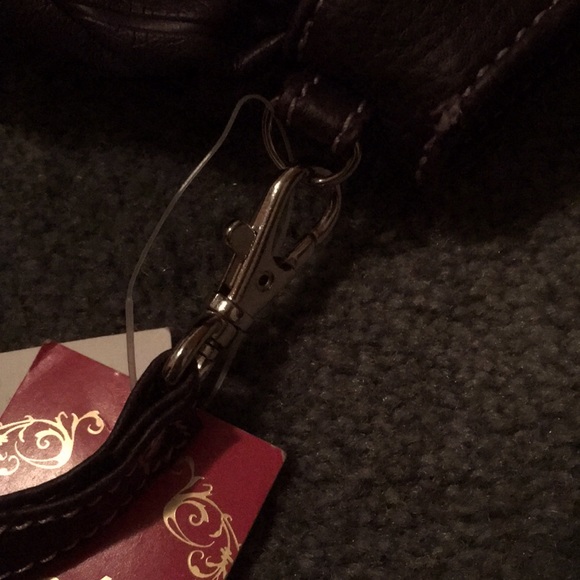 Candie’s dark purple leather clutch with wrist strap - Picture 6 of 6